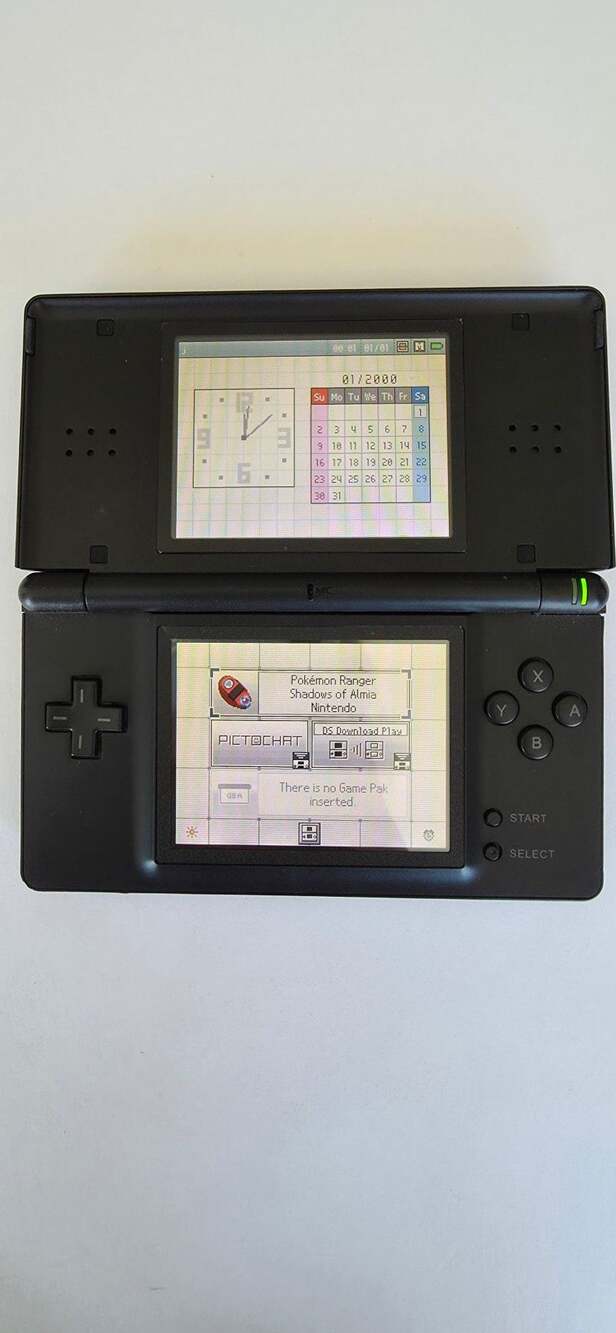 Nintendo DS Lite Handheld System with charger and Pokémon Ranger shadows game
